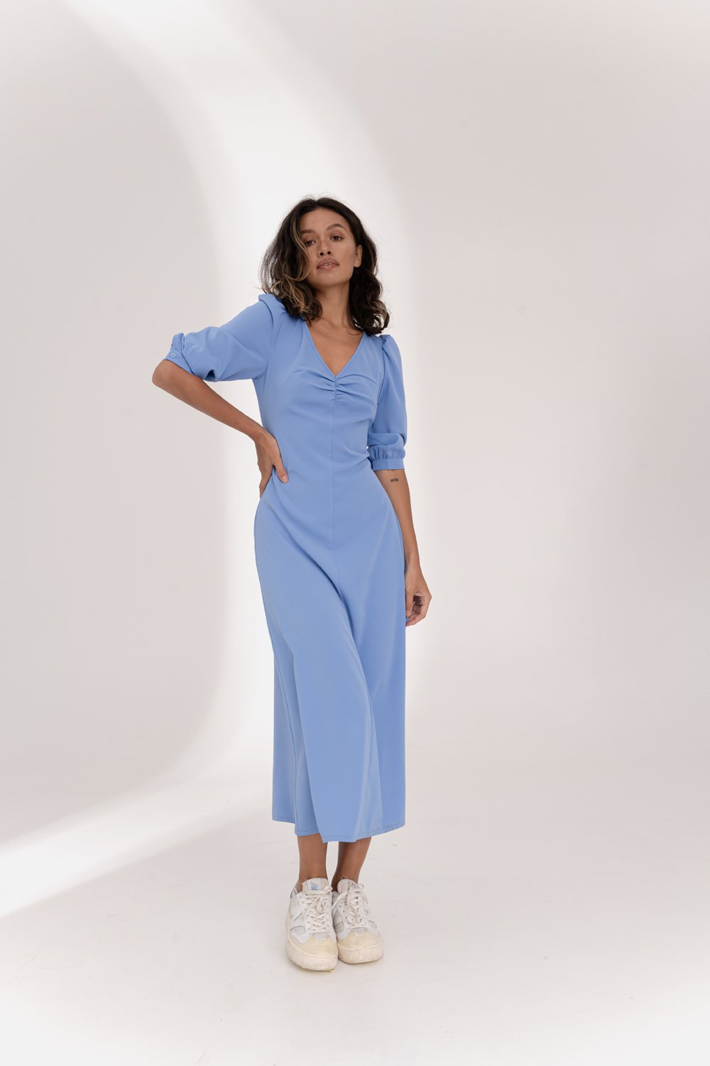 Blue flowy dress with ruching at the chest
