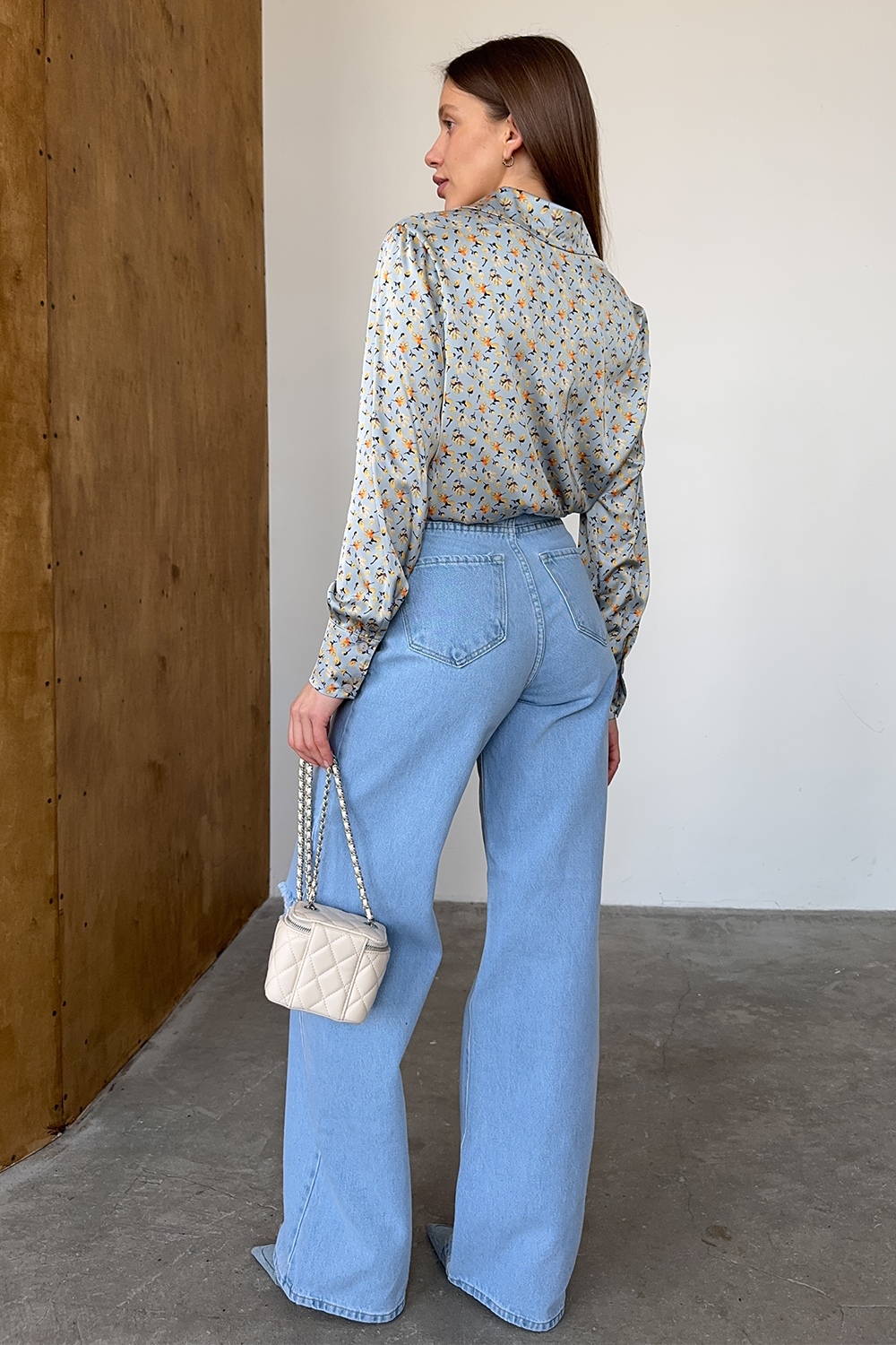 Blue loose blouse with long sleeves