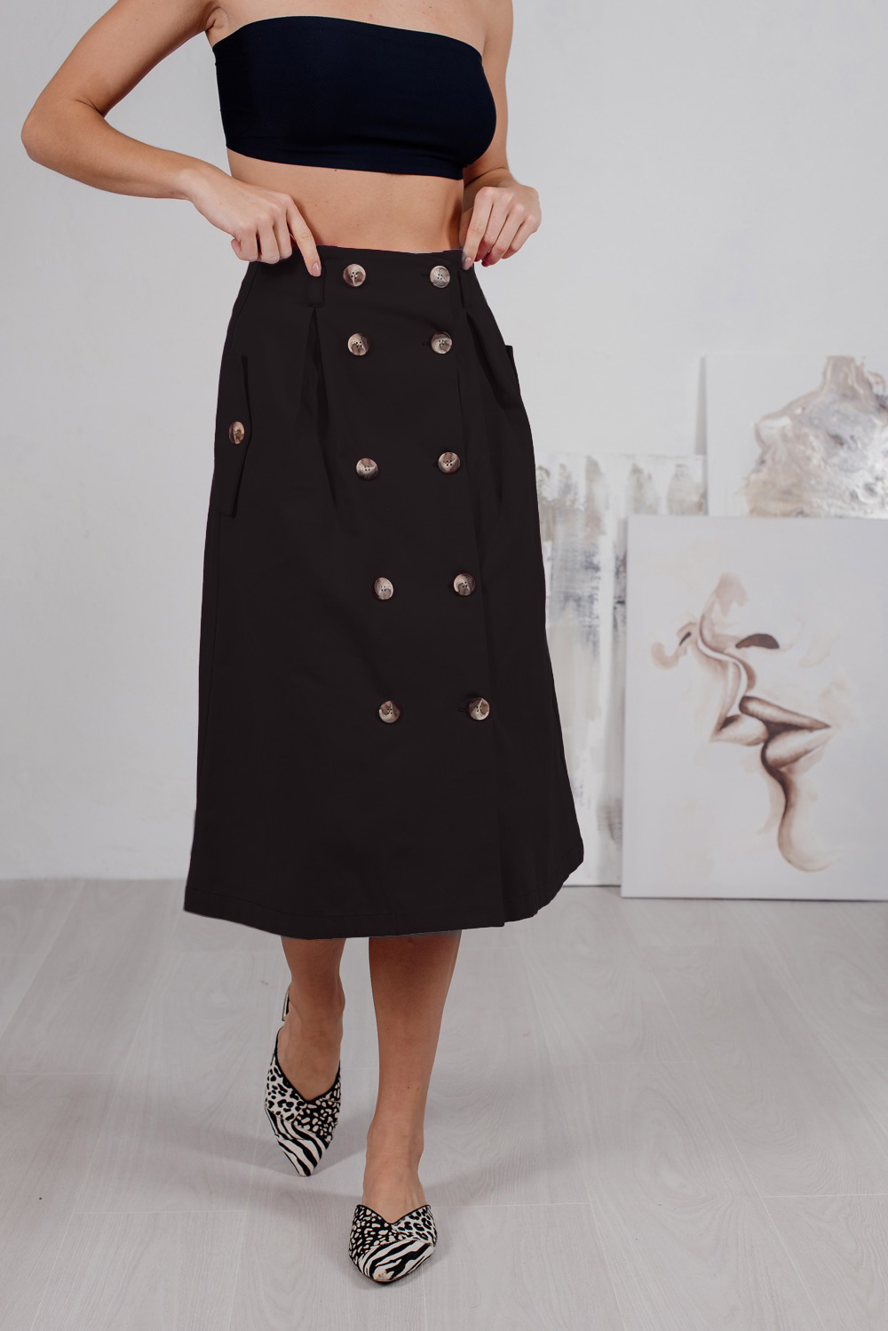 Black denim skirt with buttons and side pockets