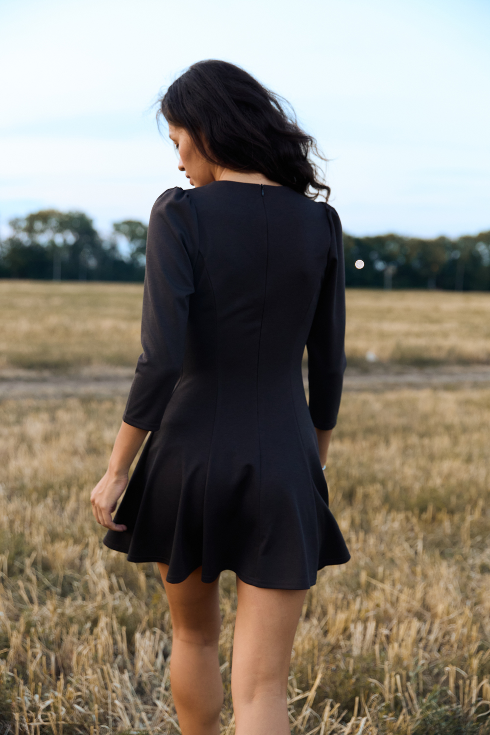 Gray knitted dress with a fluffy skirt