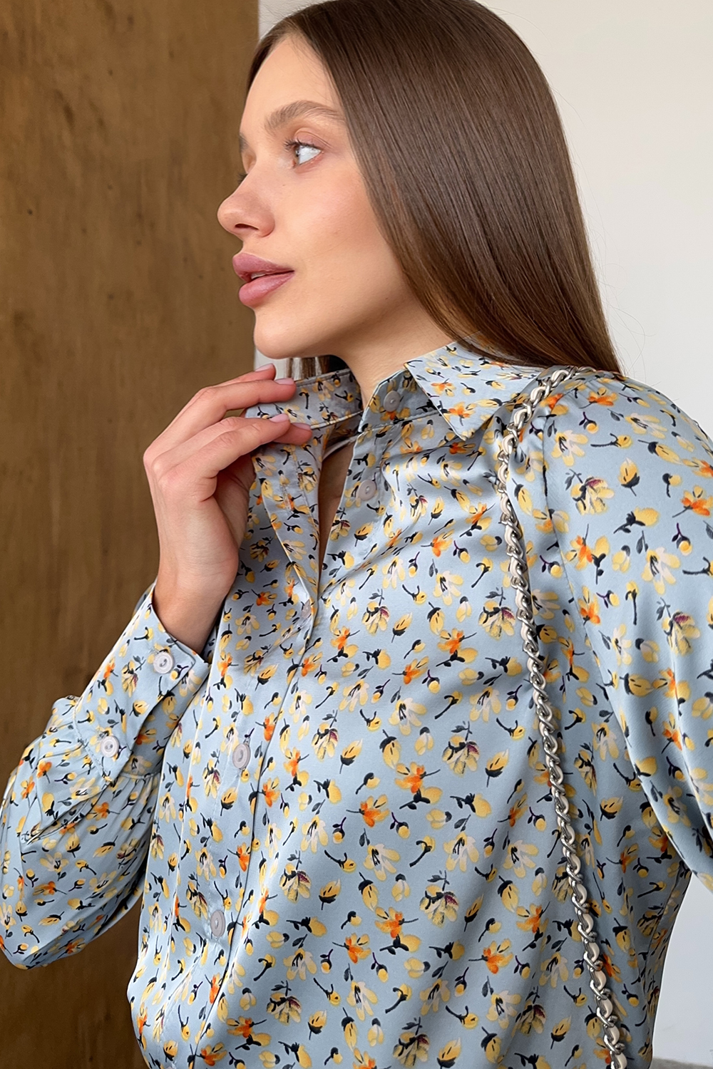 Blue loose blouse with long sleeves