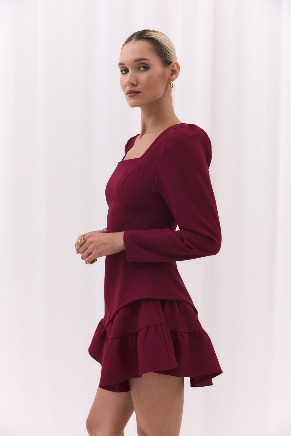 Burgundy blouse with a figured peplum