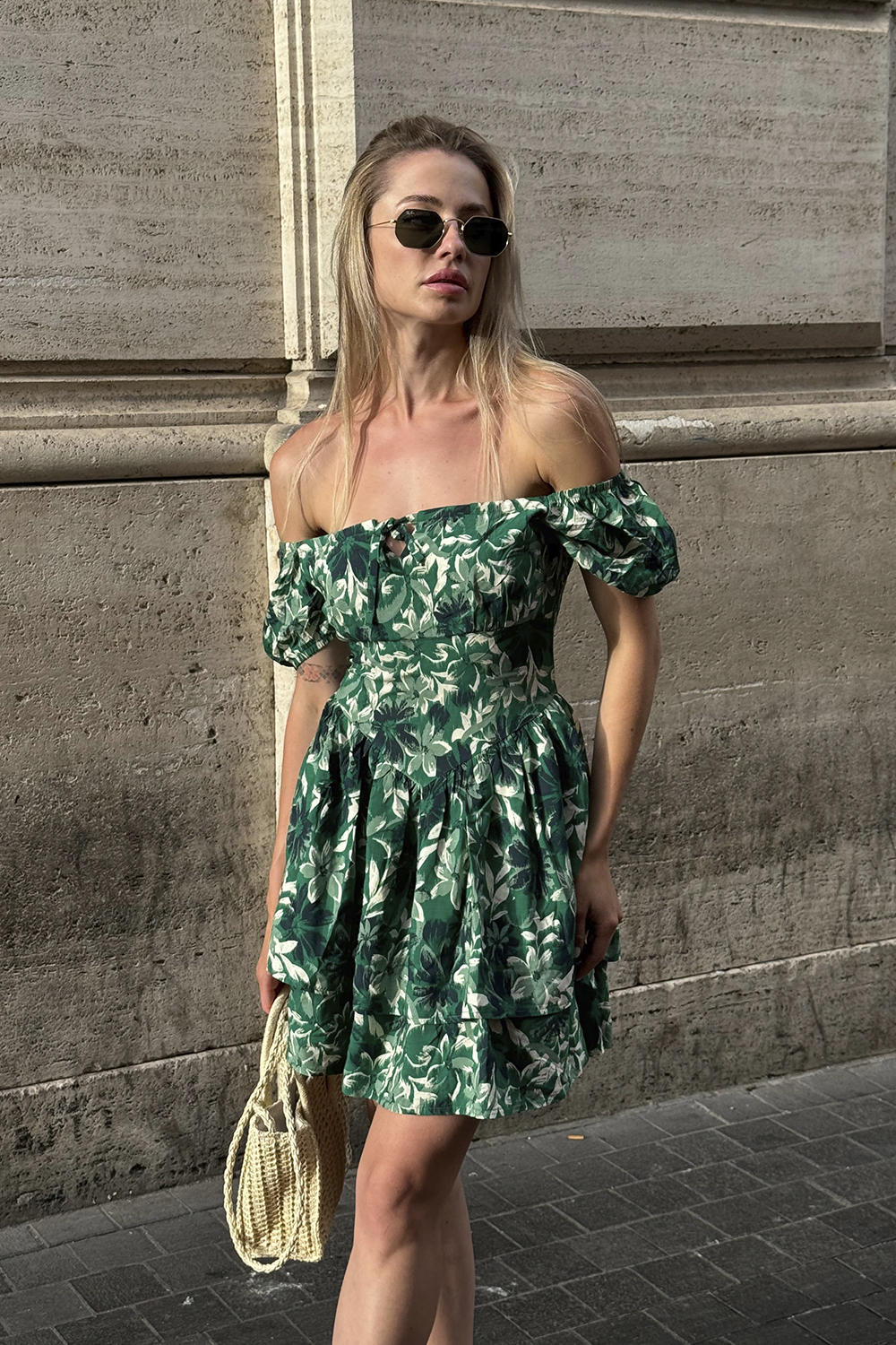 Green dress with a full double skirt and puff sleeves