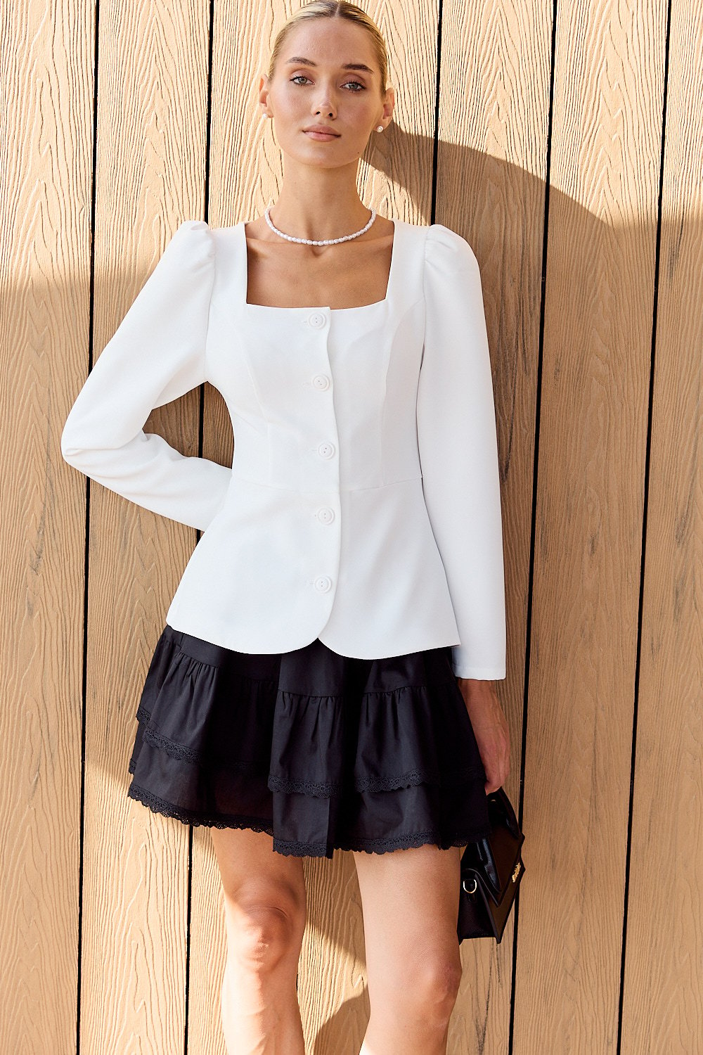 White dress with peplum and buttons