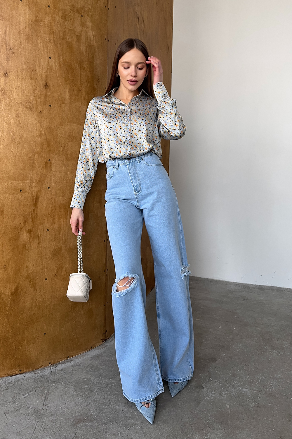 Blue loose blouse with long sleeves