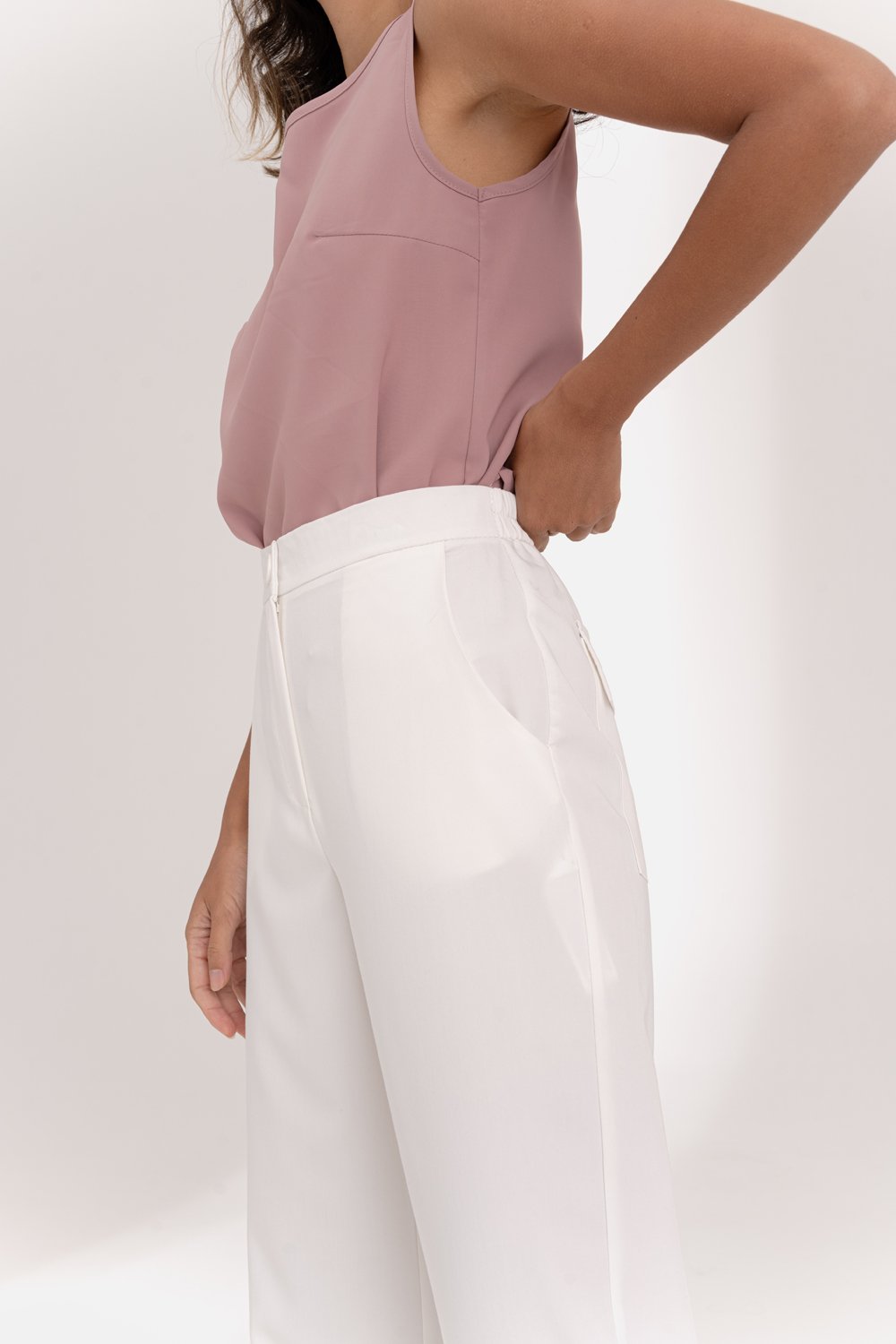 Milk trousers with an elasticated waistband and pleats at the bottom
