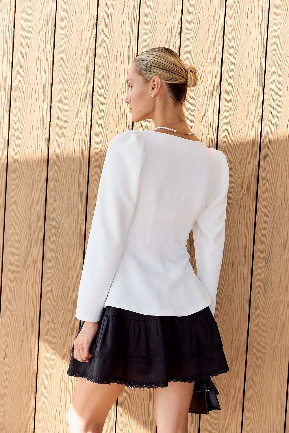 White dress with peplum and buttons