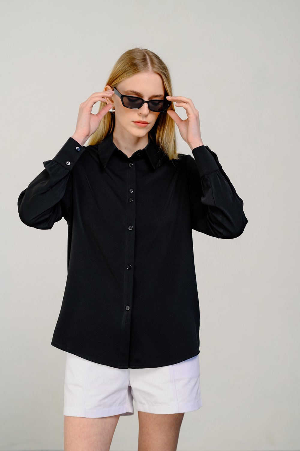 Black blouse in a romantic style