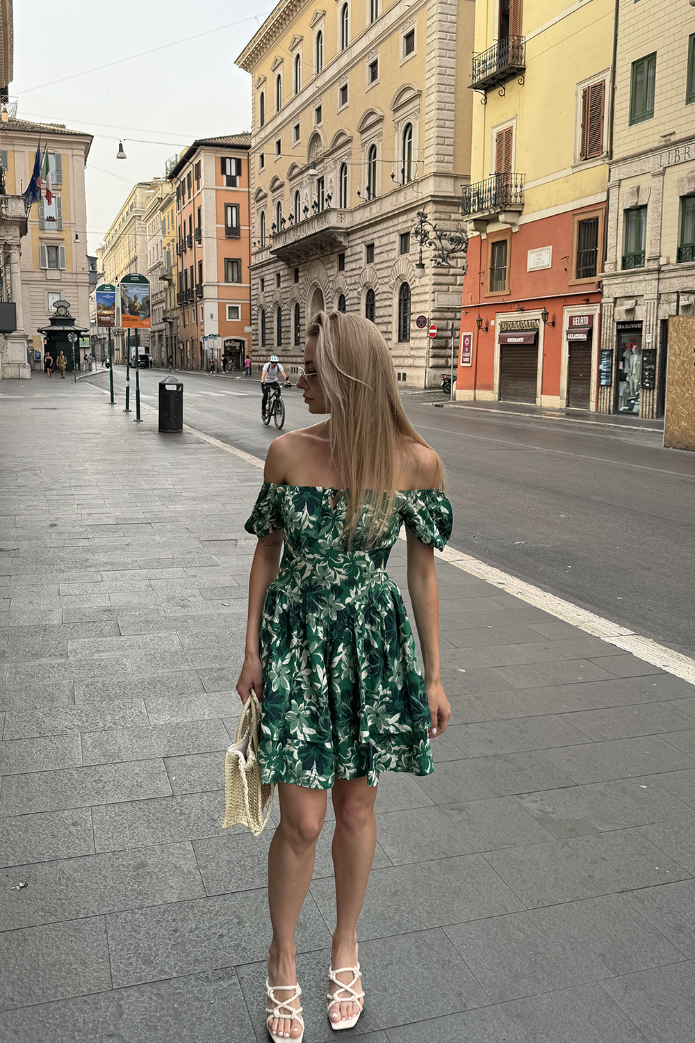 Green dress with a full double skirt and puff sleeves