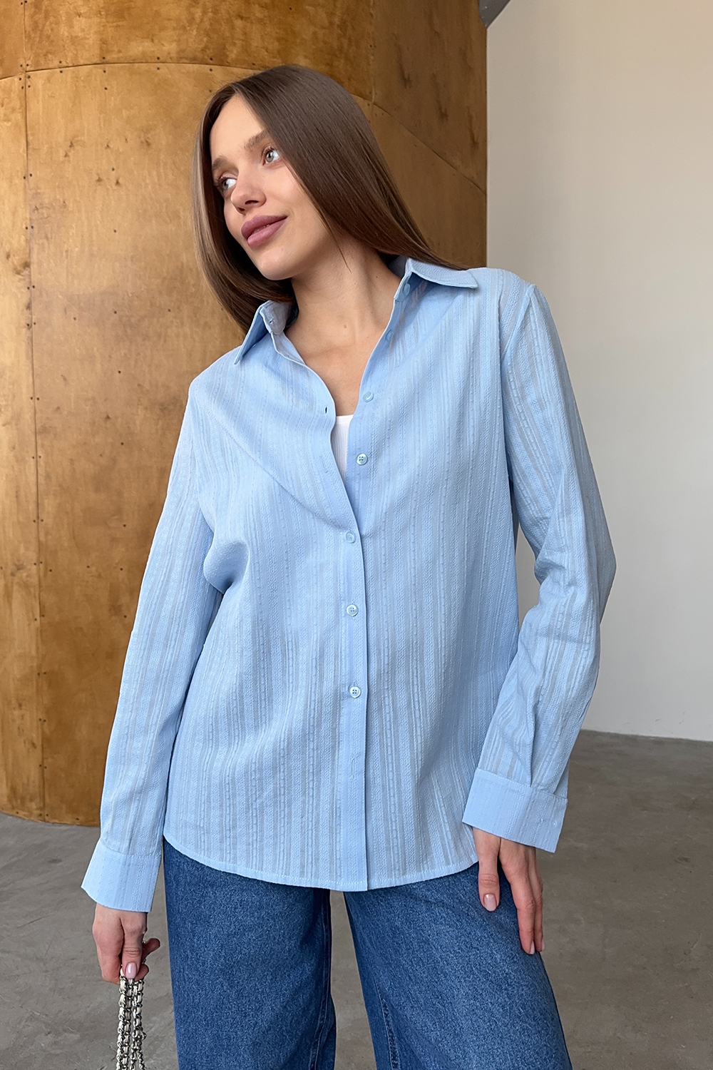 Light blue loose fit shirt made of textured cotton