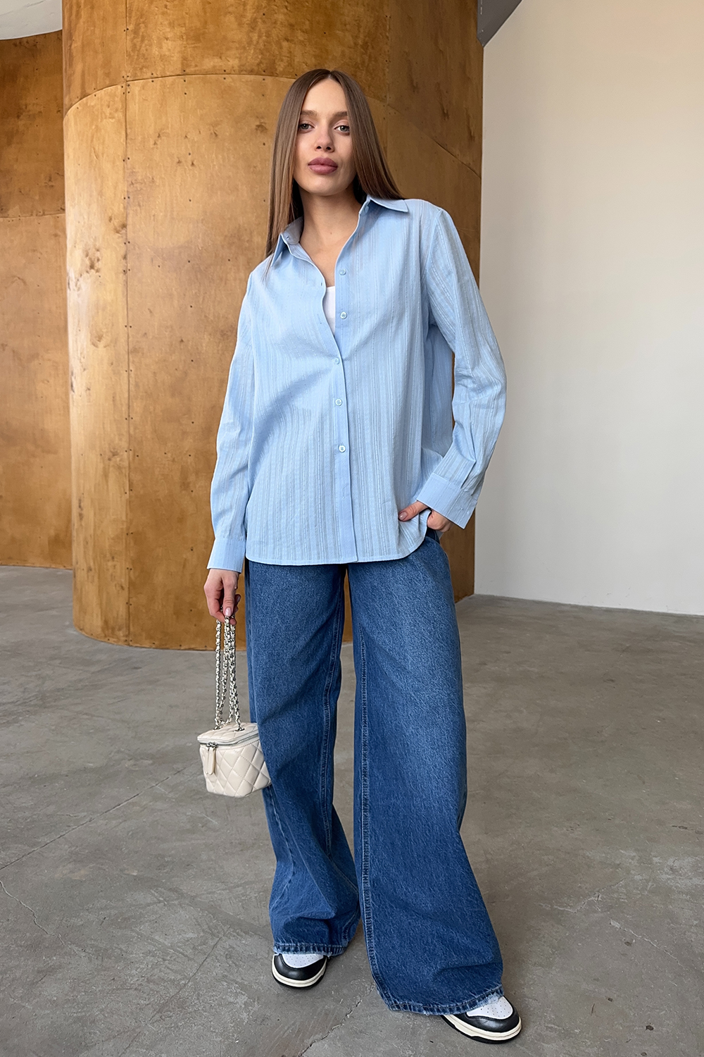 Light blue loose fit shirt made of textured cotton