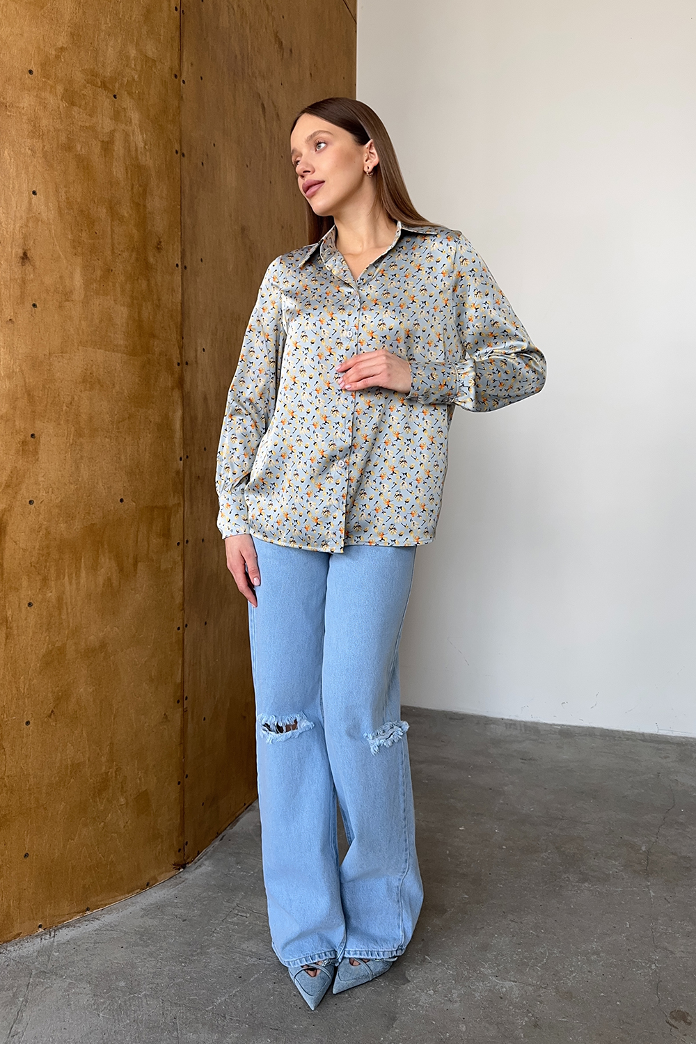 Blue loose blouse with long sleeves