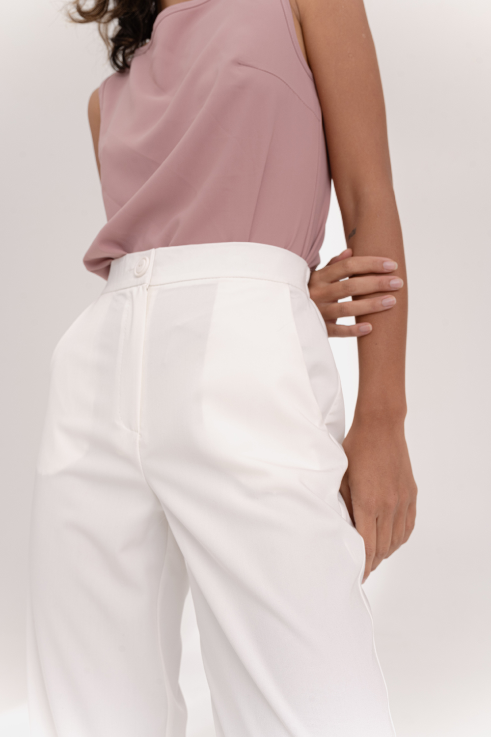 Milk trousers with an elasticated waistband and pleats at the bottom