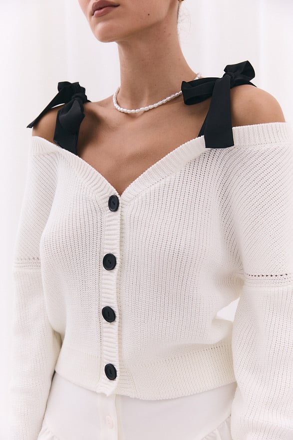 White knitted cardigan with shoulder straps