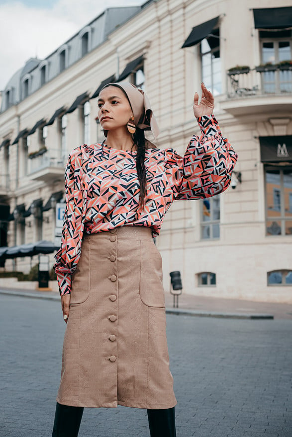 Midi skirt made of eco leather with buttons