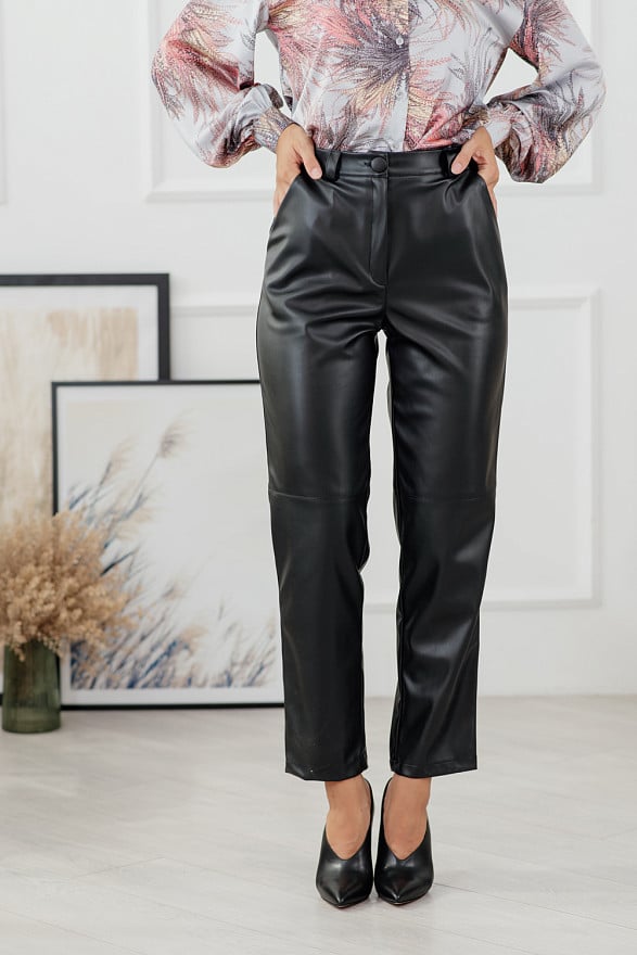 Black loose trousers made of eco leather