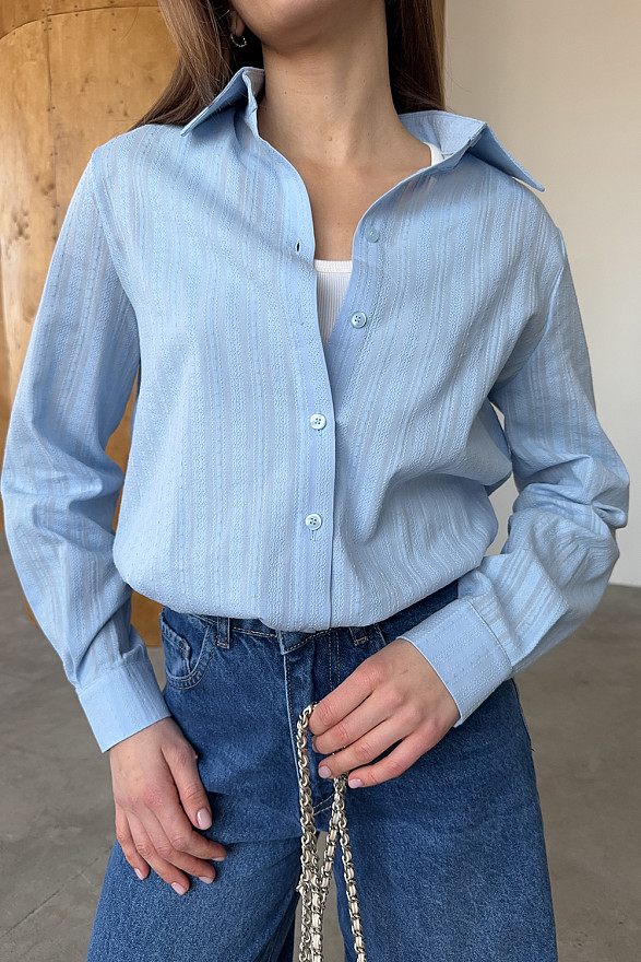 Light blue loose fit shirt made of textured cotton