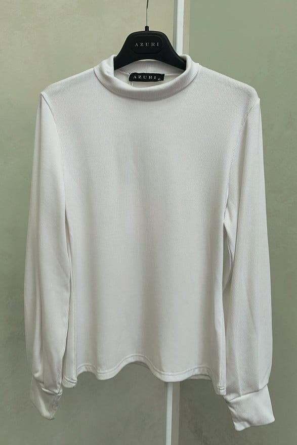 White turtleneck with puffy sleeves