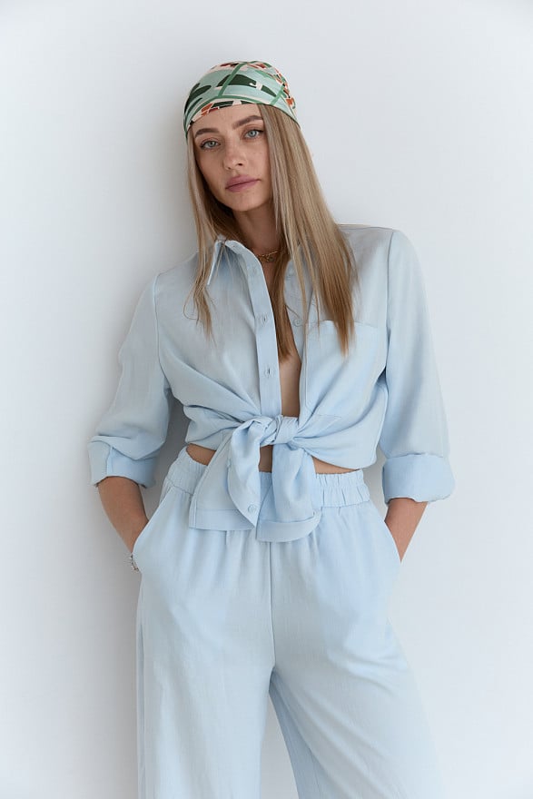 Light blue loose-fitting blouse