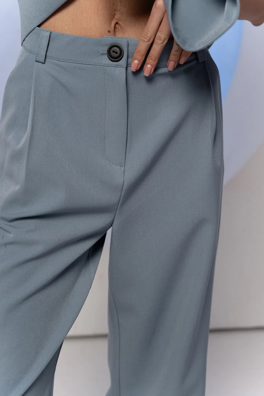 Gray-blue wide trousers with a belt