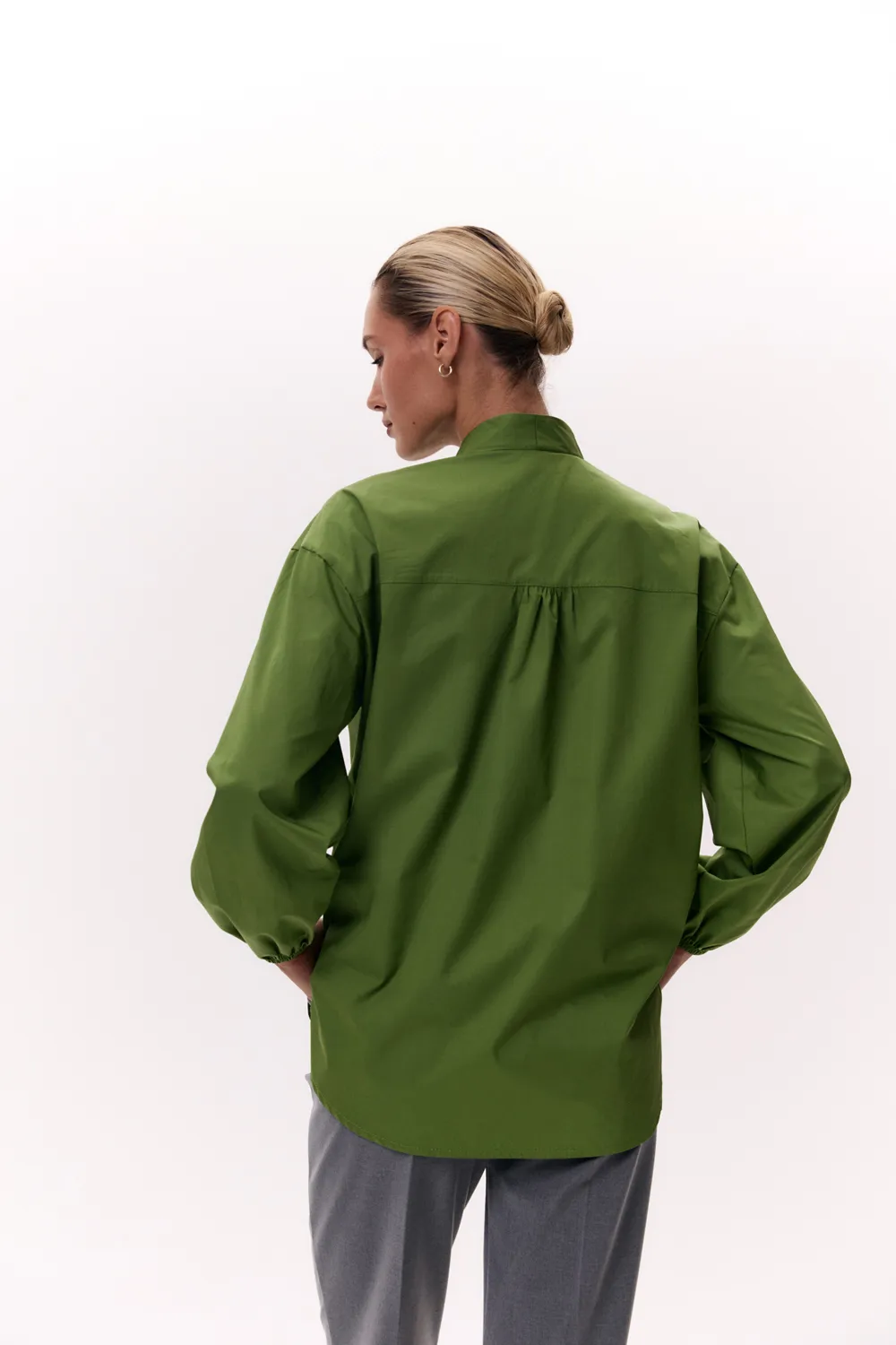 Green shirt with a one-piece stand-up collar