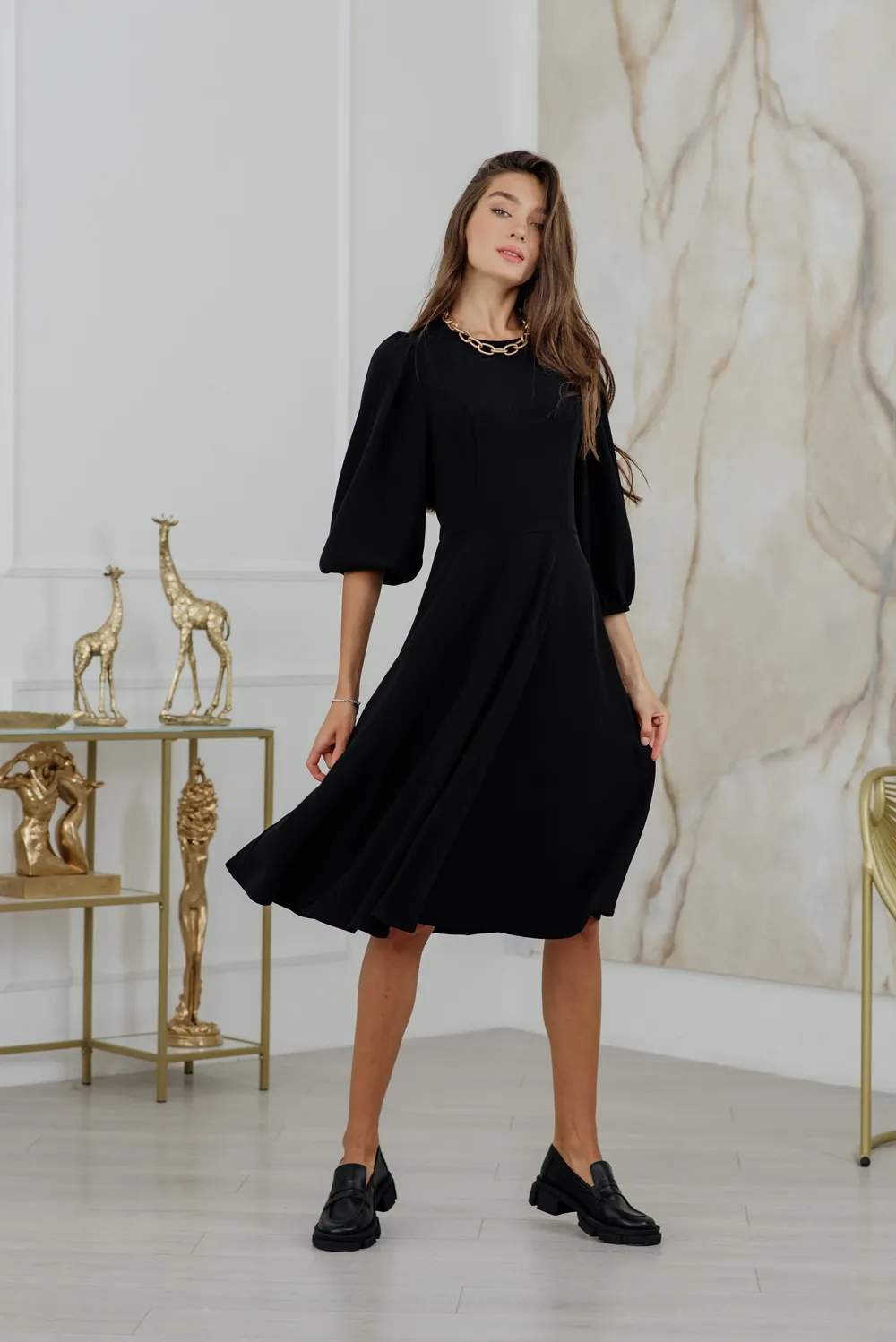 Black midi dress with wide skirt